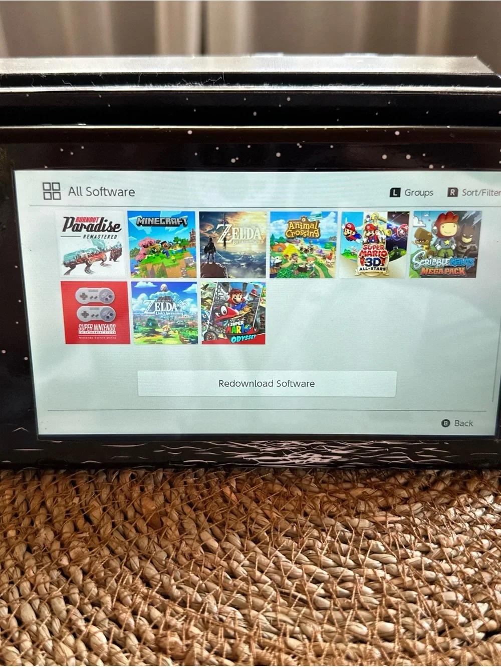Nintendo Switch Bundle in Black with Moon Dock and Two Pro Controllers